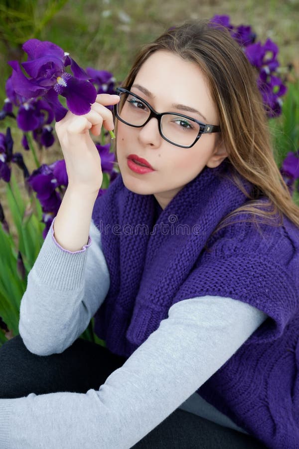 Beautiful Blonde Teen With Glasses Violet Dress Stock