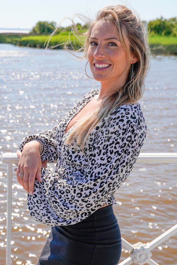 Beautiful Blonde Woman Smiling Enjoying Vacation On Harbour Beach Stock Image Image Of Blonde