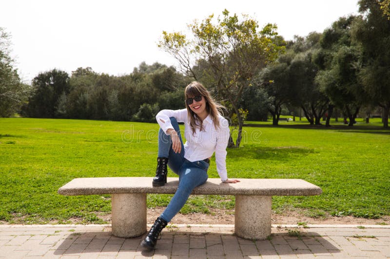 People Sitting On Bench Stock Photos, Images, & Pictures | People sitting, Sitting  poses, Kid poses