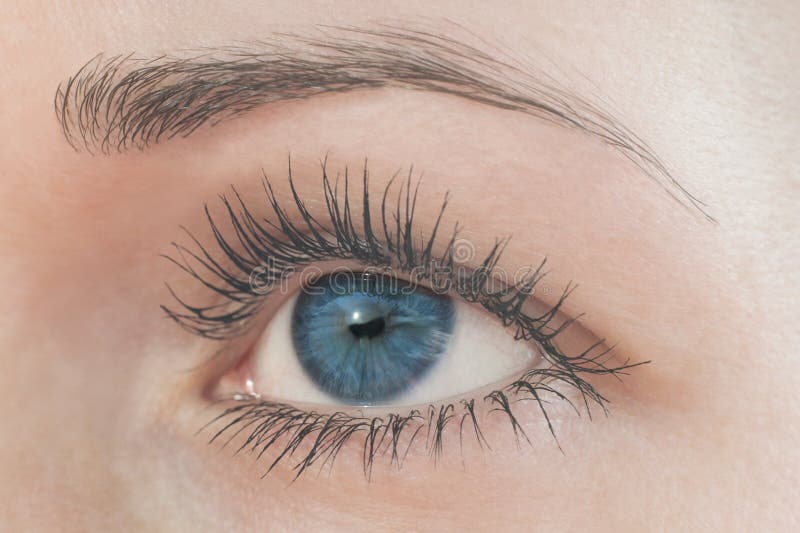 Beautiful blue eye, young beautiful woman close up