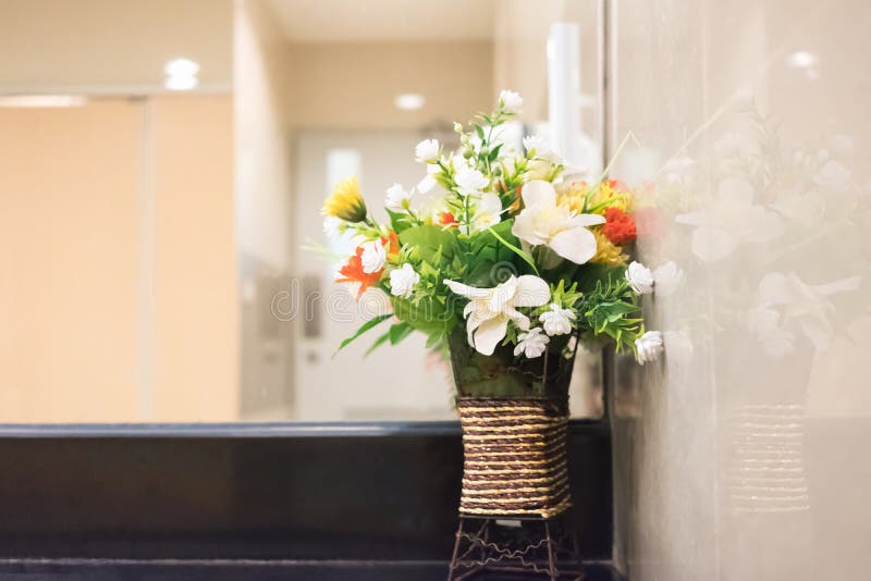 Beautiful bouquet flowers inside room interior.Copy space