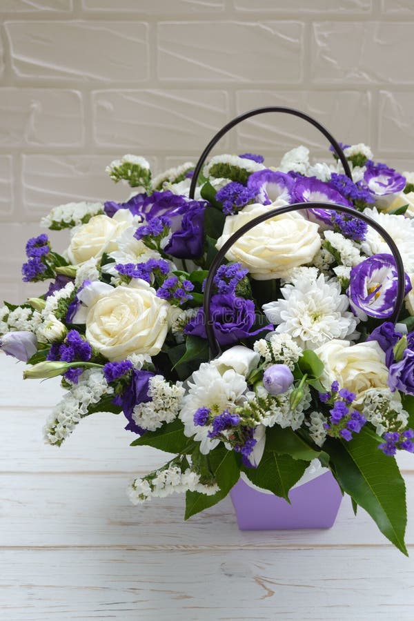 Beautiful Bouquet of White and Purple Flowers on a White Background ...