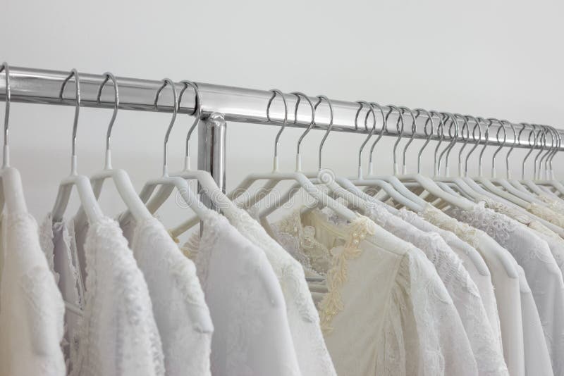 Beautiful Bridal Dress on a Hangers. Stock Photo - Image of bridal ...