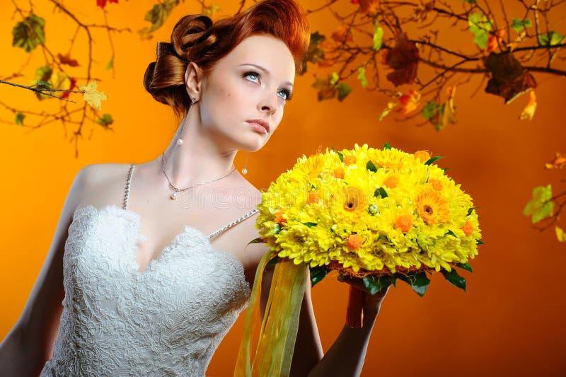 Beautiful bride with a bouquet of flowers