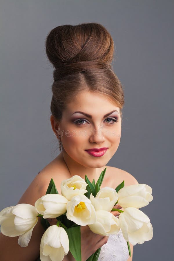 Beautiful bride with tulips