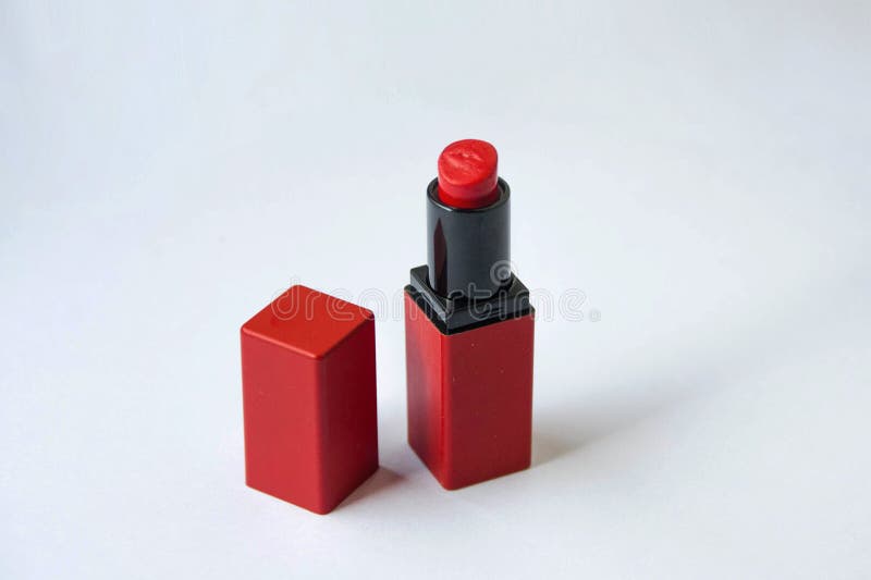 Beautiful bright lipstick in a gold box royalty free stock photography Beautiful bright lipstick in a gold box royalty free stock photography