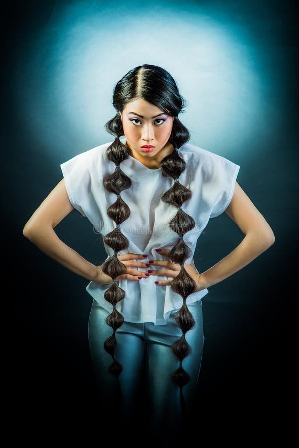 Beautiful brunette Asian woman with long black hair stock photos Beautiful brunette Asian woman with long black hair stock photos