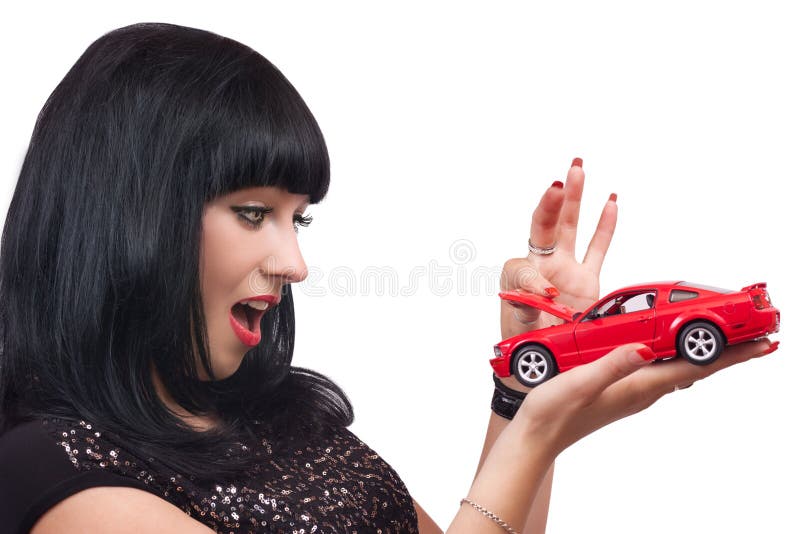 Beautiful brunette with car