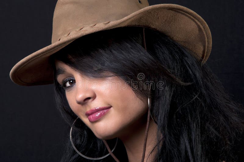 Beautiful brunette with cowboy hat