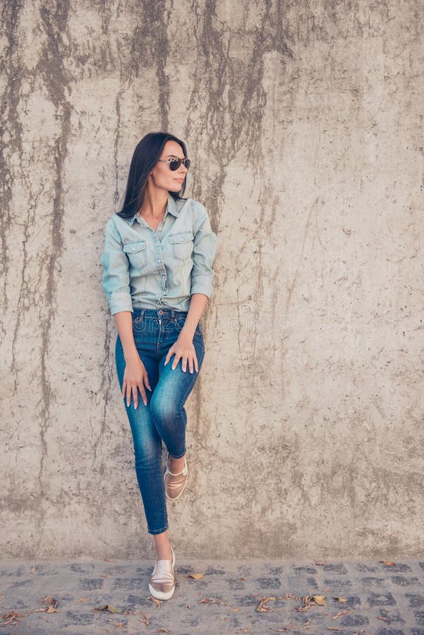 Beautiful Brunette Girl Wearing Jeans Clothes in a Modern City Stock ...