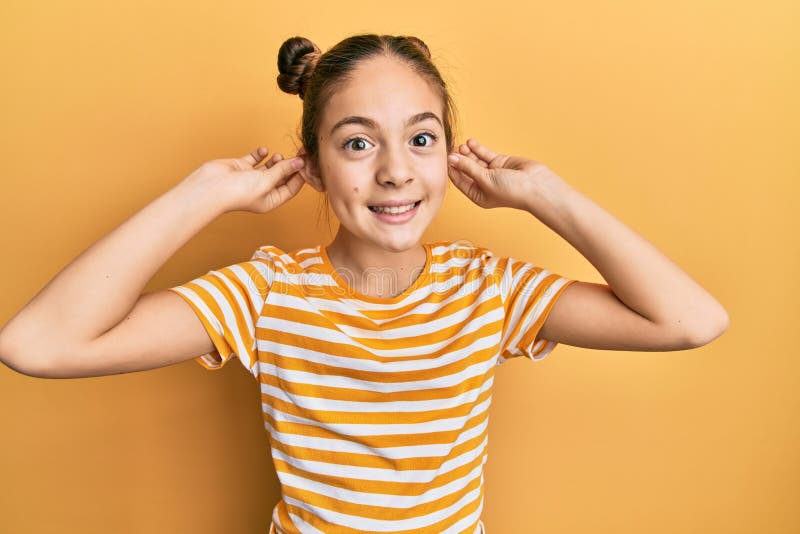 Little Girl Pulling Up Her Shirt