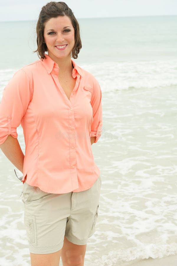 Beautiful brunette at the ocean