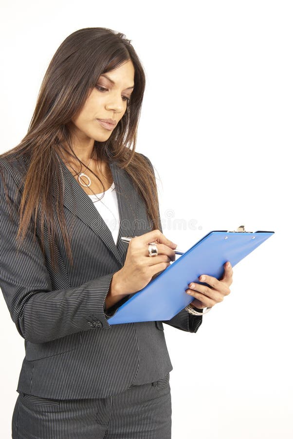 Beautiful brunette woman holding a clipboard
