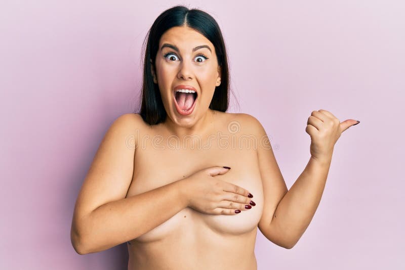 Beautiful Brunette Woman Standing Naked Covering Breasts Pointing Thumb Up  To the Side Smiling Happy with Open Mouth Stock Photo - Image of breast,  attractive: 224048920