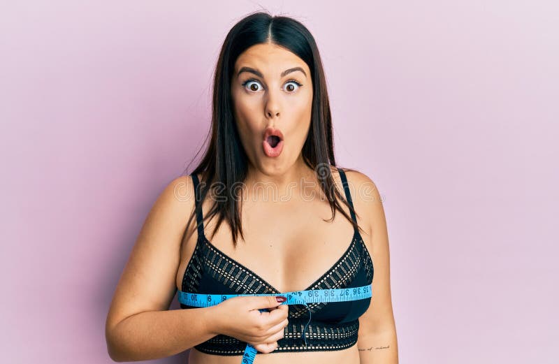 Beautiful Brunette Woman Using Tape Measure Measuring Breast Scared and  Amazed with Open Mouth for Surprise, Disbelief Face Stock Image - Image of  alarmed, body: 219653297