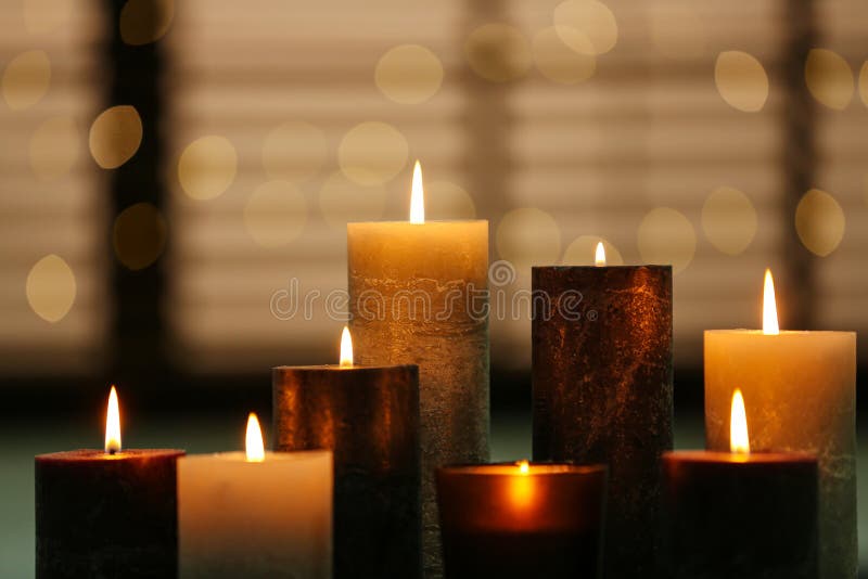 Beautiful Burning Candles Table Against Lights Stock Photo Image of