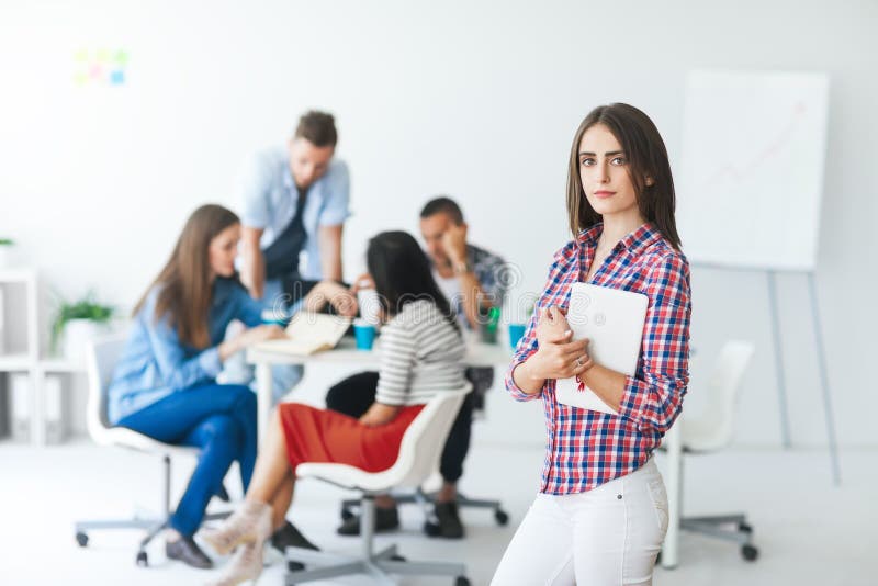 Beautiful business woman with digital tablet in modern office stock photo Beautiful business woman with digital tablet in modern office stock photo