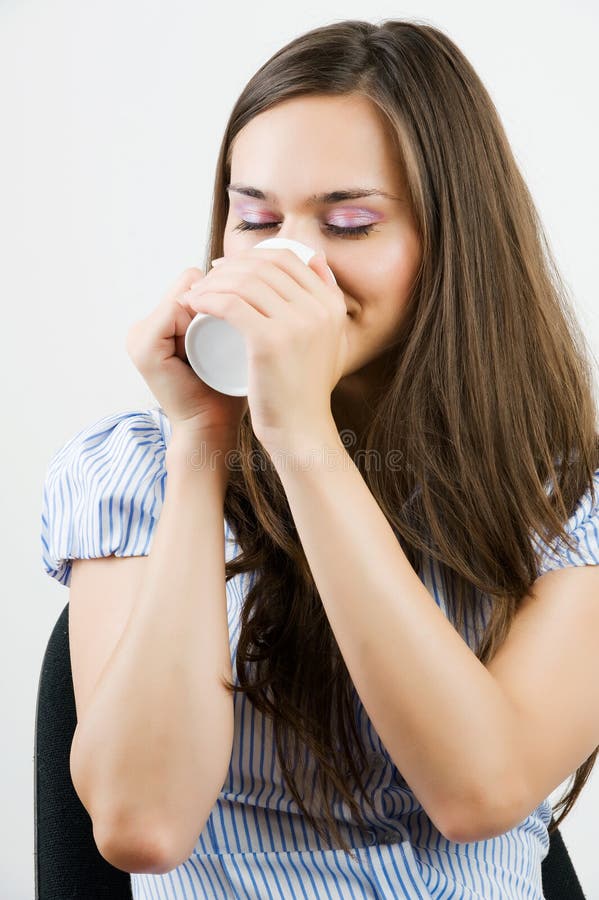 Beautiful business woman holding coffee cup