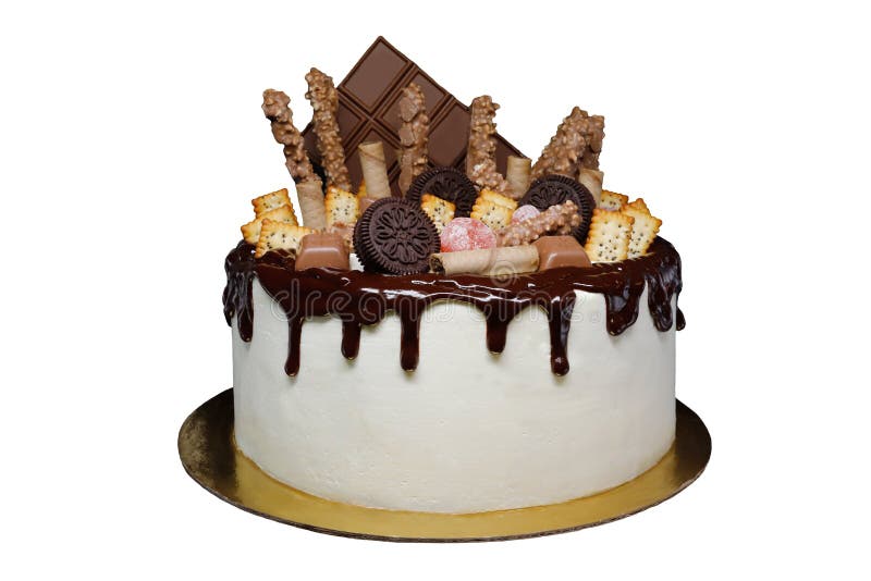 Beautiful cake covered with cottage cheese cream and chocolate icing, decorated with chocolate, cookies, kumquat. Isolated on royalty free stock images Beautiful cake covered with cottage cheese cream and chocolate icing, decorated with chocolate, cookies, kumquat. Isolated on royalty free stock images