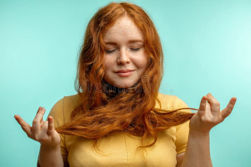 Beautiful Calm Redhead Female Holding Hands In Mudra Gesture Stock 