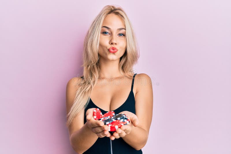 Beautiful Caucasian Blonde Girl Holding Casino Chips Looking at the Camera Blowing a Kiss Being Lovely and Stock Image - Image of expression, funny: 226139349 Beautiful Caucasian Blonde Girl Holding Casino Chips Looking at the Camera Blowing a Kiss Being Lovely and Stock Image - Image of expression, funny: 226139349
