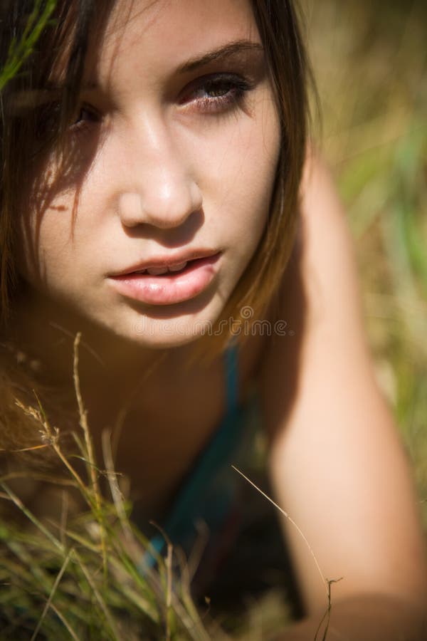 Caucasian Girl Drinking Water after Exercise Stock Photo