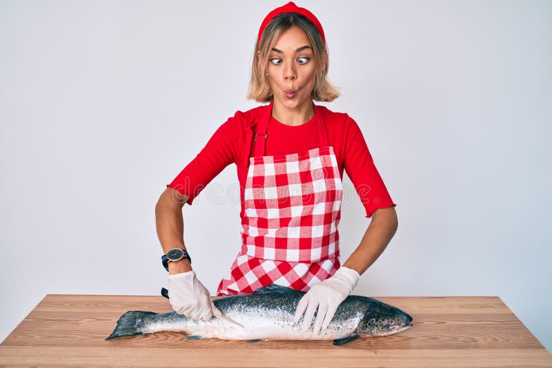 Beautiful Caucasian Woman Fishmonger Selling Fresh Raw Salmon Making ...