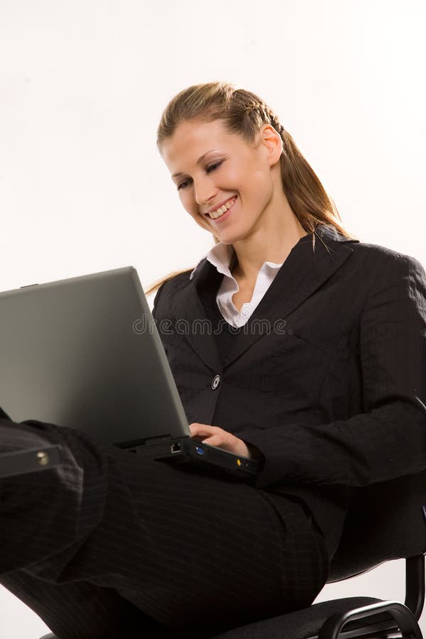 Beautiful caucasian woman working at laptop over