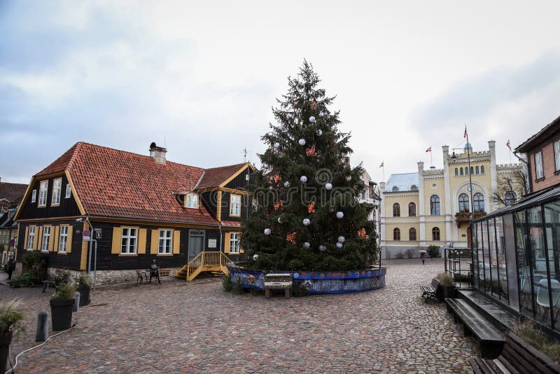 Beautiful central Christmass tree infront of government building in Goldingen. Small city located in Latvia, Europe. Photo taken in December, winter stock photography Beautiful central Christmass tree infront of government building in Goldingen. Small city located in Latvia, Europe. Photo taken in December, winter stock photography