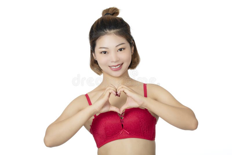 Chinese Woman Posing in Panties and Bra on White Background Stock