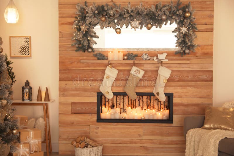Beautiful Christmas Interior of Living Room with Fireplace Stock Photo