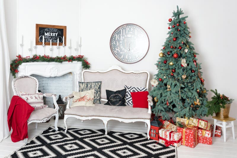 Beautiful Christmas interior. New year decoration. Comfort home. Classic new year tree decorated in a room with