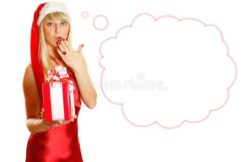 Beautiful girl in a red dress and hat of Santa with a big gift box. Expressed surprise, his hand covers his mouth open. Near drawn air thoughts. Lots of copyspace and room for text on this isolate. Bright red hat stock images, royalty-free photos and pictures