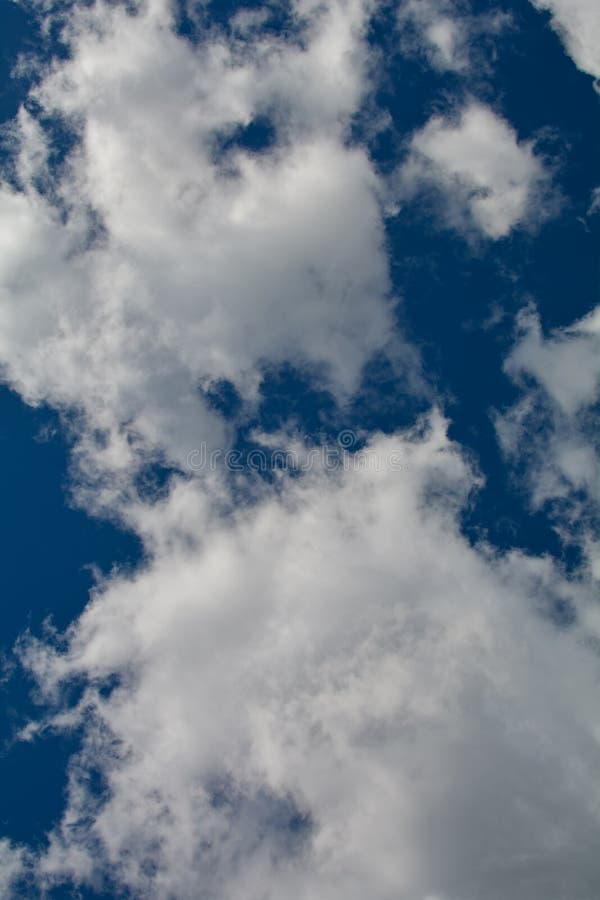 Wonderful white clouds against a blue sky stock images Wonderful white clouds against a blue sky stock images