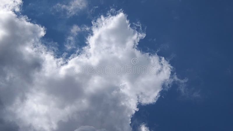 Beautiful cloudscape with white building clouds