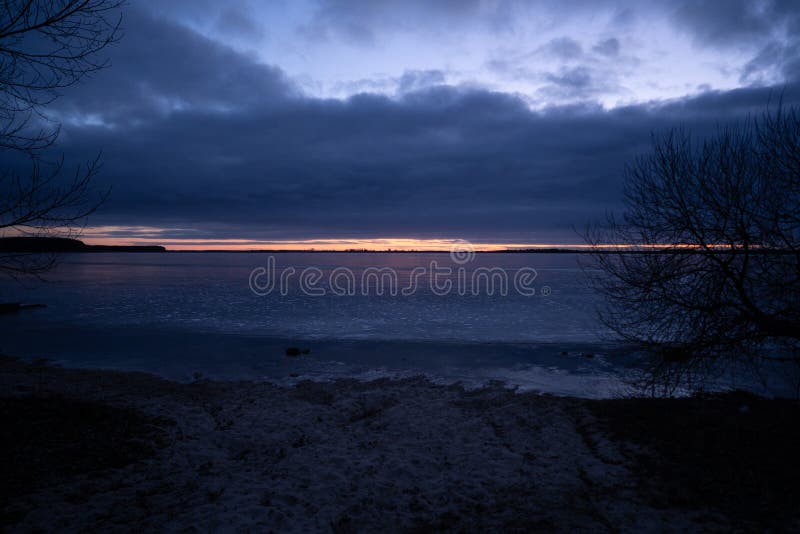 Beautiful Cold Sunrise Over A Frozen Lake Stock Photo Image Of