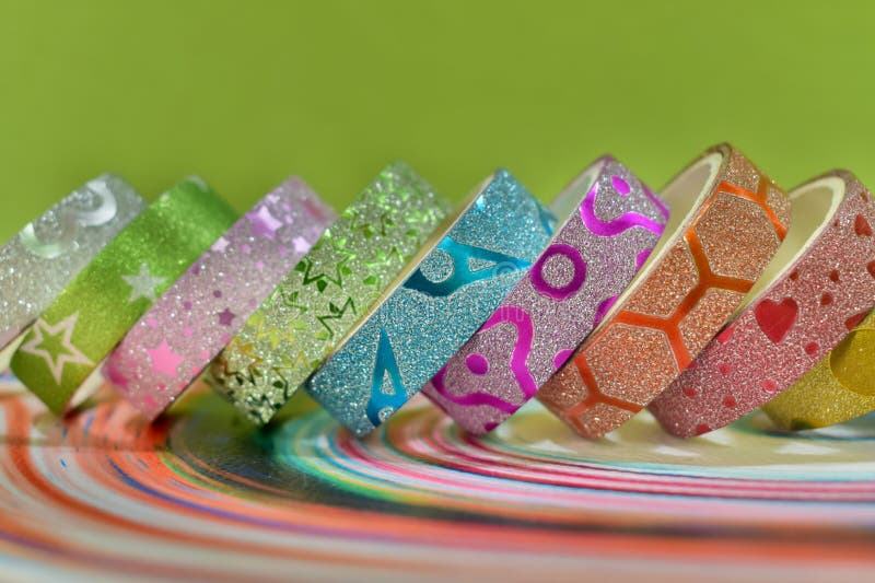 Beautiful Colourful glitter texture designed adhesive tape for amazing art craft ideas. Best design tapes can be used for decoration, crafting, art projects stock photos Beautiful Colourful glitter texture designed adhesive tape for amazing art craft ideas. Best design tapes can be used for decoration, crafting, art projects stock photos