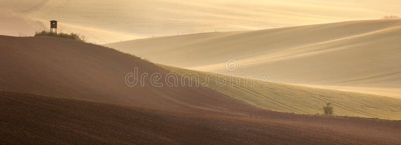 Beautiful countryside fields landscape at sunrise time. Beautiful countryside panoramic landscape at sunrise time - agricultural fields, pastel colors stock photos Beautiful countryside fields landscape at sunrise time. Beautiful countryside panoramic landscape at sunrise time - agricultural fields, pastel colors stock photos