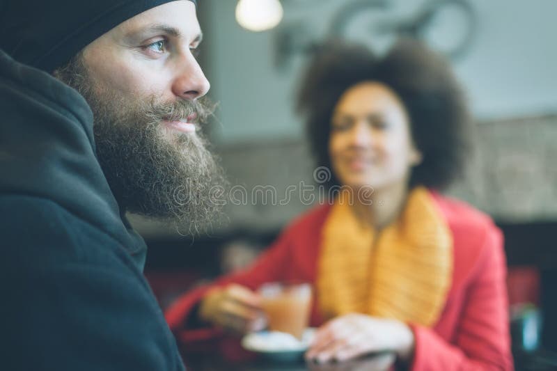 Beautiful couple enjoying tea in a restaurant stock images Beautiful couple enjoying tea in a restaurant stock images