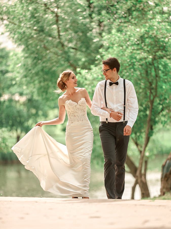 Beautiful couple in love for a walk in the summer Park stock photography Beautiful couple in love for a walk in the summer Park stock photography