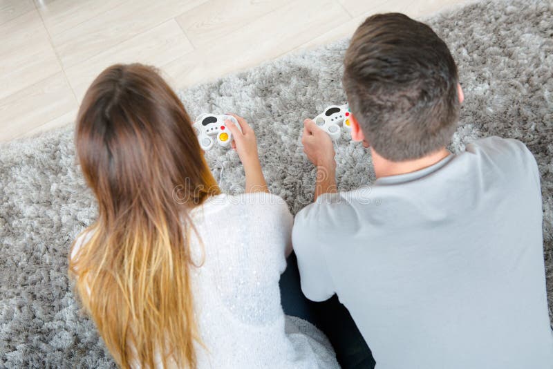 Annoyed Girlfriend Waiting for Boyfriend To Stop Playing Video-games Stock  Photo - Image of game, gamer: 100430632