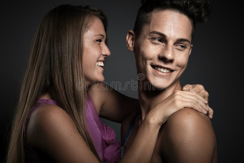 Sharing A Tender Moment A Loving Young Couple Standing Together