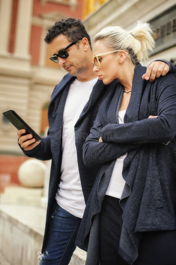 Beautiful couple with tablet in the city royalty free stock photo Beautiful couple with tablet in the city royalty free stock photo