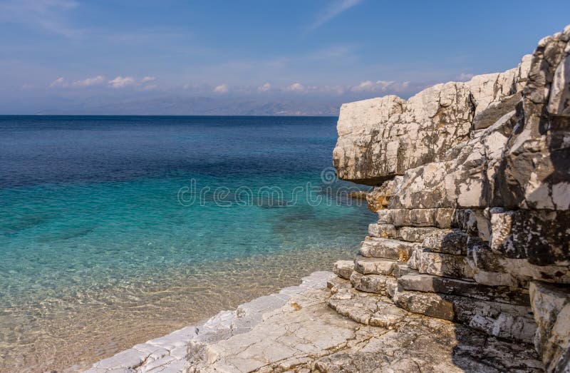 Beautiful crystal clear waters from the beach of Kassiopi, Corfu, Greece stock photography Beautiful crystal clear waters from the beach of Kassiopi, Corfu, Greece stock photography