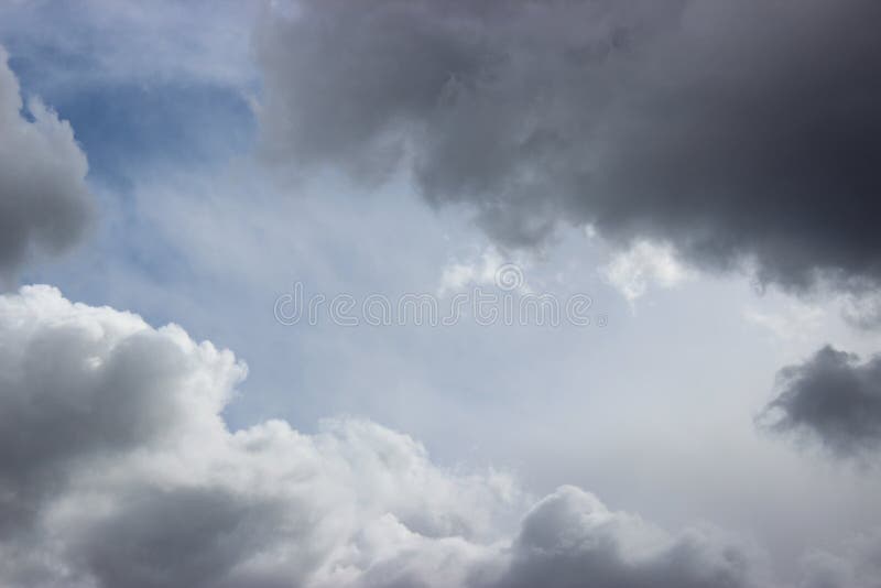 Beautiful Cumulus Clouds of Bizarre Shapes. Stock Image - Image of
