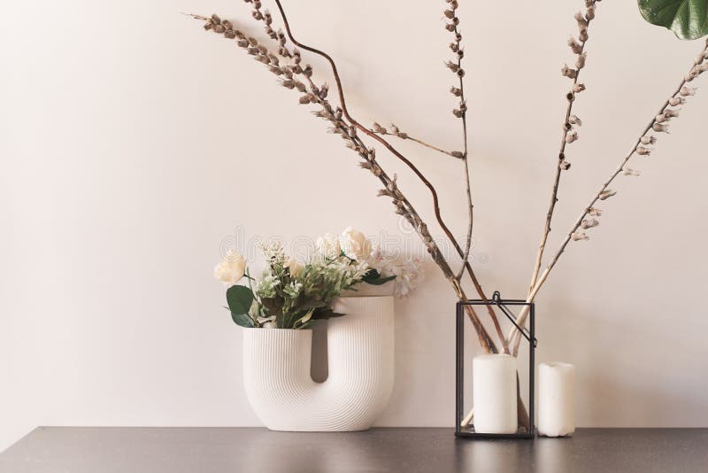 Beautiful curved vase with flowers close-up. Flowers in interior design. Cozy house. royalty free stock photo Beautiful curved vase with flowers close-up. Flowers in interior design. Cozy house. royalty free stock photo