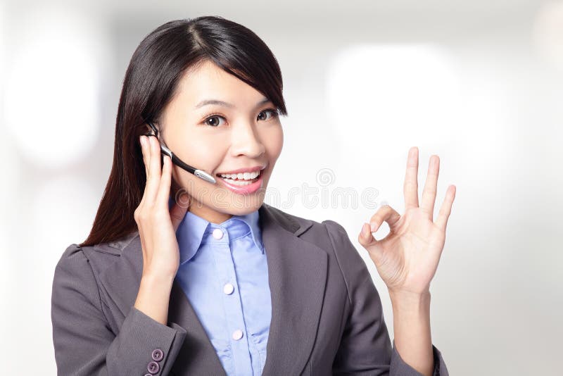 Beautiful customer service operator woman with headset