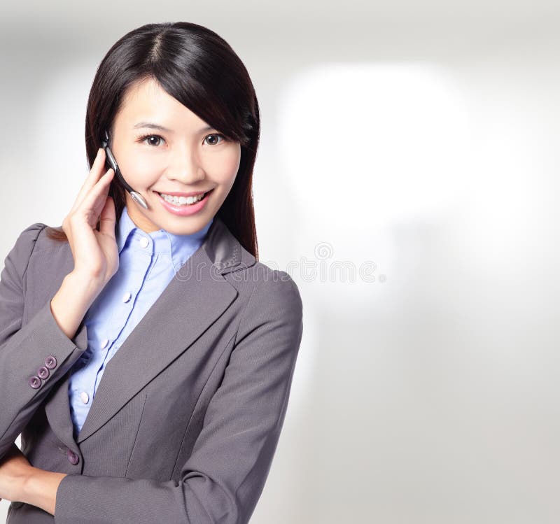 Beautiful customer service operator woman with headset