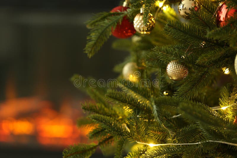 Beautiful decorated Christmas tree indoors, closeup. Space for text royalty free stock image