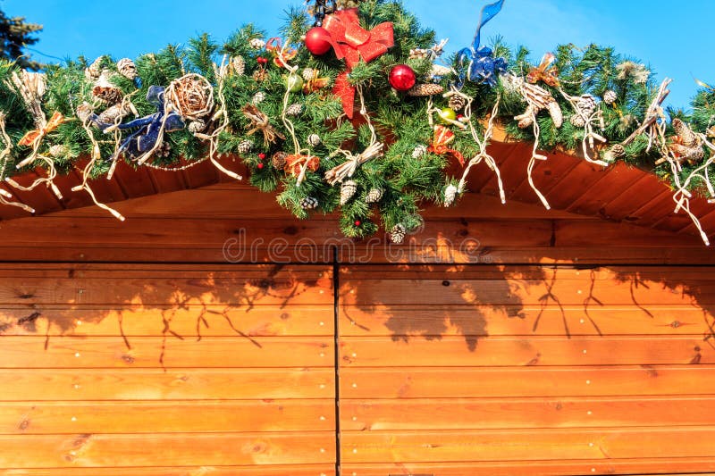 Beautiful decorations for Christmas and New Year holidays on wooden house stock photography